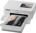 Canon SELPHY CP1500 Mini Fotodrucker mobil tragbar unterwegs (bis Postkartengröße 10x15cm, farbstabil 100 Jahre) weiß [ohne Farbband/Papier, WLAN, App